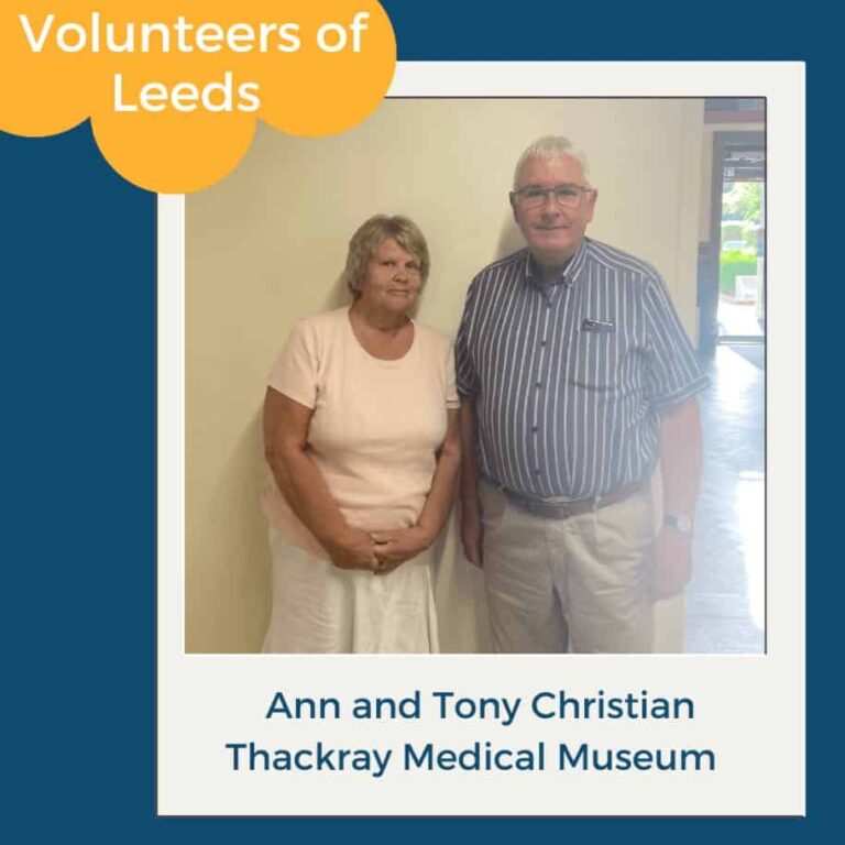 Ann and Tony Christian volunteering together at Thackray Medical Museum, Leeds. Volunteers of Leeds label shown.